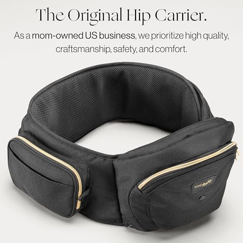 Tushbaby The Original Safety-Certified Hip Carrier for Babies & Toddlers: Machine Washable Child Waist Seat with Pocket Storage, As Seen on Shark Tank (23”-44” waist, 0-3 yrs up to 45lbs) – Black/Gold