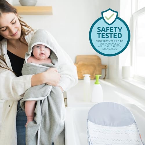 The First Years Sure Comfort Folding Baby Bather - Baby to Toddler Bath Tub - No-Slip Seat - for Sink or Tub Use
